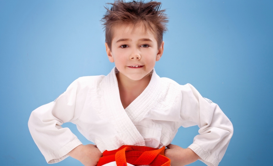Boy in karate costume.